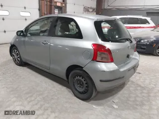2008 Toyota Yaris with VIN JTDJT923085171725, listed as a IAAI auction lot 42090252 with 242,092 mi miles. Bid and sale history available at carsss.com. Image 3.
