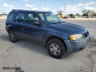 2001 Ford Escape XLS with VIN 1FMYU01BX1KB53168, listed as a Copart auction lot 76547834 with 71,025 mi miles and Salvage Title. Bid and sale history available at carsss.com. Image 4.