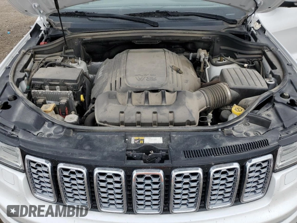 2019 Jeep Grand Cherokee Summit with VIN 1C4RJFJT4KC848996, listed as a Copart auction lot 54974925 with 106,517 mi miles and Salvage title. Bid and sale history available at DreamBid. Image 12.