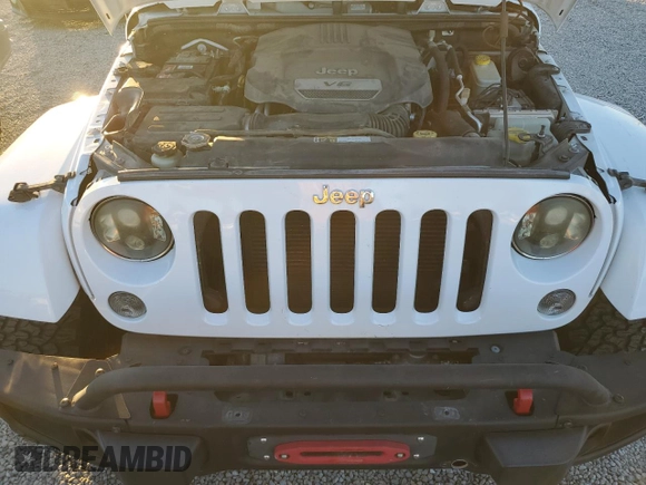 2015 Jeep Wrangler Unlimited Rubicon with VIN 1C4BJWFG5FL659017, listed as a Copart auction lot 84435034 with 69,915 mi miles and Salvage Title. Bid and sale history available at carsss.com. Image 11.