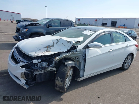 2012 Hyundai Sonata SE z VIN 5NPEC4AC4CH362031, wystawiony jako IAAI lot #41796480 z przebiegiem 160 659 mil mil oraz . Historia ofert i sprzedaży dostępna na DreamBid. Obrazek 2.