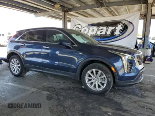 2022 Cadillac XT4 FWD Luxury с VIN 1GYAZAR40NF120224, выставлен на аукционе Copart как лот 61100285 с пробегом 35 260 миль миль и Списание • Salvage title. История ставок и продаж доступна на DreamBid. Изображение 4.