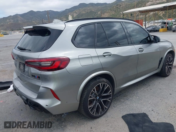 2022 BMW X5 M with VIN 5YMJU0C00N9M59253, listed as a IAAI auction lot 41476833 with 27,813 mi miles. Bid and sale history available at carsss.com. Image 4.