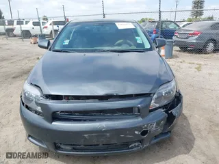 2006 Scion tC with VIN JTKDE177260081483, listed as a IAAI auction lot 42076072 with 156,556 mi miles. Bid and sale history available at carsss.com. Image 13.