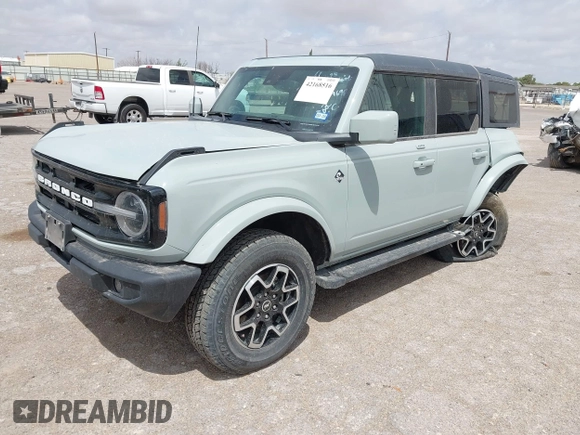 2023 Ford Bronco z VIN 1FMEE5BP9PLA97587, wystawiony jako IAAI lot #42168516 z przebiegiem 29 622 mil mil oraz . Historia ofert i sprzedaży dostępna na DreamBid. Obrazek 2.