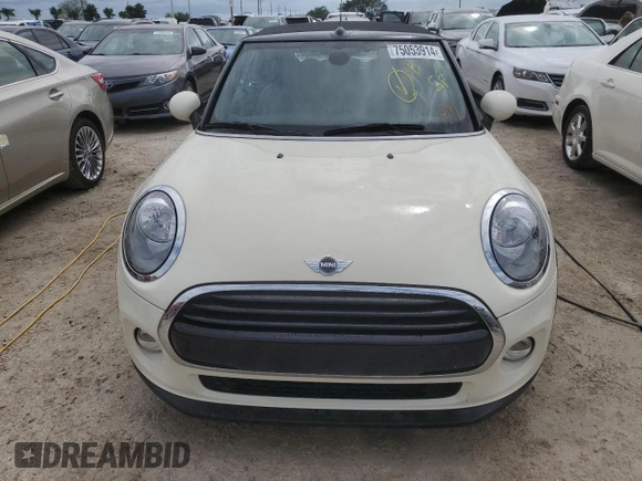 2017 MINI Convertible Cooper z VIN WMWWG5C38H3C99627, wystawiony jako Copart lot #75053914 z przebiegiem 42 087 mil mil oraz Nie do naprawy • Non repairable. Historia ofert i sprzedaży dostępna na DreamBid. Obrazek 5.