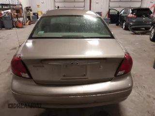 2003 Ford Taurus SES Standard with VIN 1FAFP552X3G184894, listed as a IAAI auction lot 41846677 with 160,824 mi miles. Bid and sale history available at carsss.com. Image 16.