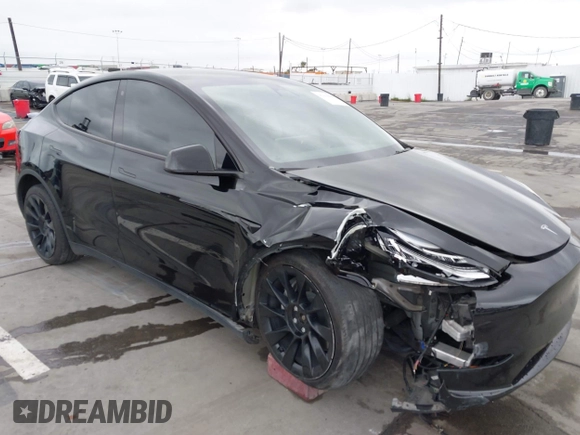 2022 Tesla Model Y Long Range z VIN 7SAYGDEE0NF508958, wystawiony jako IAAI lot #42191819 z przebiegiem 60 880 mil mil oraz . Historia ofert i sprzedaży dostępna na DreamBid. Obrazek 6.