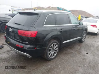 2019 Audi Q7 Premium with VIN WA1AHAF74KD029904, listed as a IAAI auction lot 41024012 with 79,896 mi miles and . Bid and sale history available at DreamBid. Image 4.