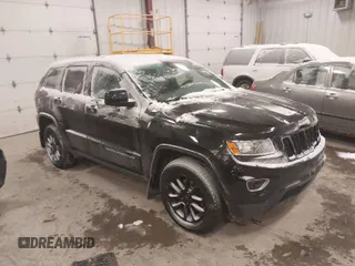 2016 Jeep Grand Cherokee Laredo with VIN 1C4RJFAGXGC311561, listed as a IAAI auction lot 41364024 with 134,042 mi miles. Bid and sale history available at carsss.com. Image 1.