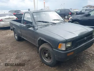 1992 Toyota Pickup z VIN JT4RN81A4N0093028, wystawiony jako IAAI lot #42143876 z przebiegiem 260 981 mil mil oraz . Historia ofert i sprzedaży dostępna na DreamBid. Obrazek 1.
