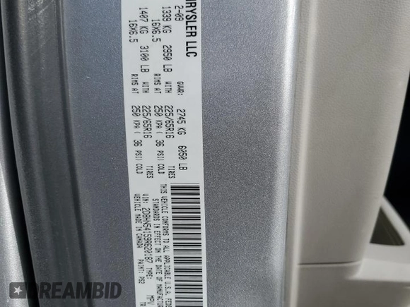 2009 Dodge Grand Caravan SXT z VIN 2D8HN54159R620187, wystawiony jako Copart lot #84703224 z przebiegiem 206 240 mil mil oraz Szkoda całkowita • Salvage title. Historia ofert i sprzedaży dostępna na DreamBid. Obrazek 13.