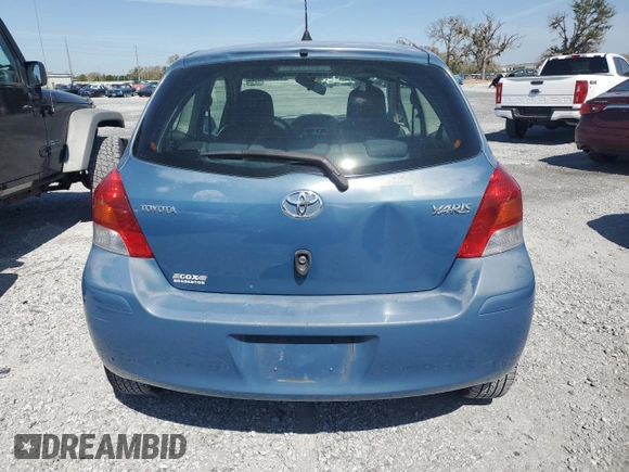2011 Toyota Yaris with VIN JTDJT4K35B5330328, listed as a Copart auction lot 46904665 with 107,100 mi miles and Salvage Title. Bid and sale history available at carsss.com. Image 6.
