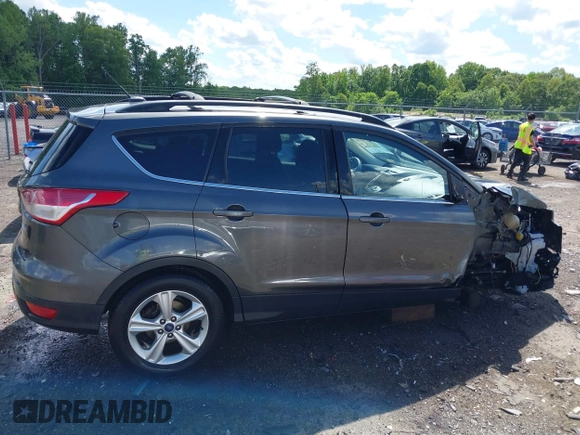 2016 Ford Escape SE z VIN 1FMCU9GX8GUA79697, wystawiony jako IAAI lot #42199779 z przebiegiem 131 826 mil mil oraz . Historia ofert i sprzedaży dostępna na DreamBid. Obrazek 14.