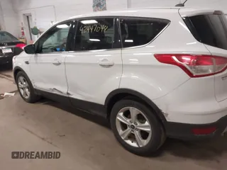 2013 Ford Escape SE with VIN 1FMCU0GX5DUA74237, listed as a IAAI auction lot 42447048 with 140,732 mi miles and . Bid and sale history available at DreamBid. Image 6.