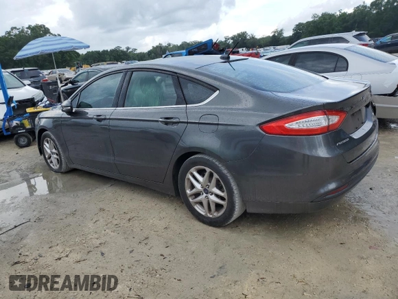 2015 Ford Fusion SE with VIN 3FA6P0H72FR190227, listed as a Copart auction lot 60090595 with 111,197 mi miles and Salvage title. Bid and sale history available at DreamBid. Image 2.