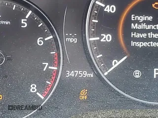 2024 Mazda CX-50 S Preferred z VIN 7MMVABBMXRN171661, wystawiony jako IAAI lot #42102155 z przebiegiem 34 759 mil mil oraz . Historia ofert i sprzedaży dostępna na DreamBid. Obrazek 7.