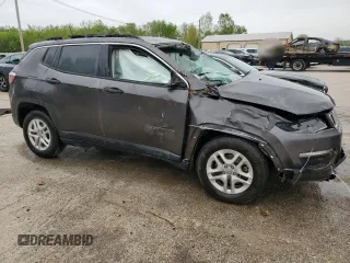 2019 Jeep Compass Sport with VIN 3C4NJCAB1KT847992, listed as a Copart auction lot 54329705 with 101,303 mi miles and Salvage title. Bid and sale history available at DreamBid. Image 4.