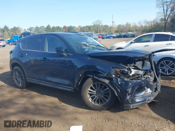 2019 Mazda CX-5 Touring with VIN JM3KFBCM6K0513037, listed as a IAAI auction lot 42121789 with 59,455 mi miles and . Bid and sale history available at DreamBid. Image 13.