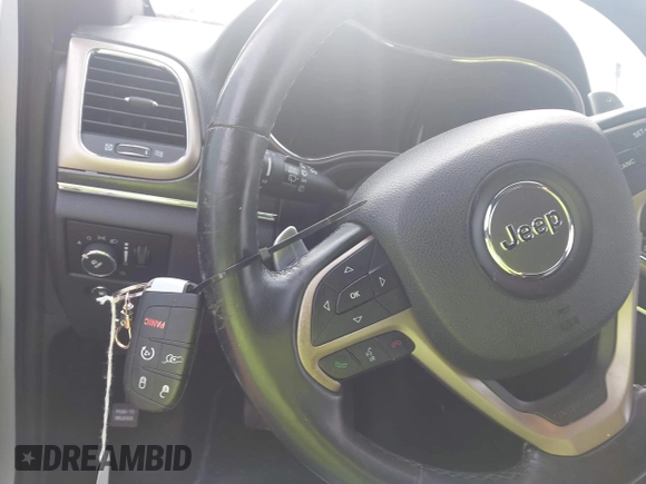 2014 Jeep Grand Cherokee Limited with VIN 1C4RJEBG6EC157551, listed as a IAAI auction lot 42006861 with 159,536 mi miles and . Bid and sale history available at DreamBid. Image 11.
