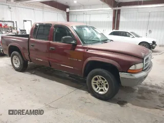 2001 Dodge Dakota Sport with VIN 1B7GG2AN71S209614, listed as a IAAI auction lot 42066349 with 242,675 mi miles. Bid and sale history available at carsss.com. Image 1.