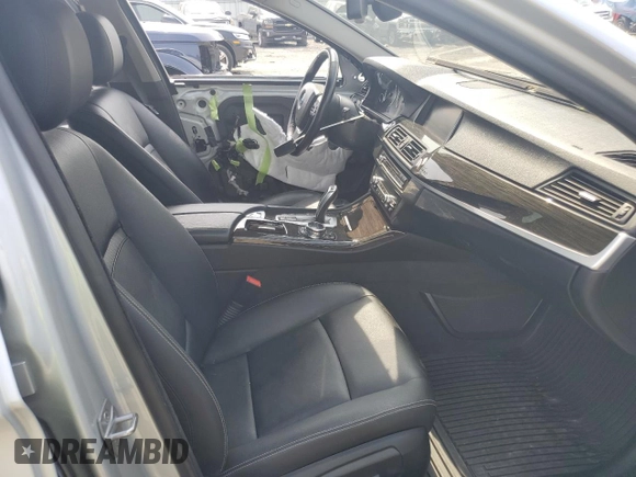 2014 BMW 5 Series 535i xDrive with VIN WBA5B3C5XED530918, listed as a Copart auction lot 60143395 with 104,784 mi miles and Clean title. Bid and sale history available at DreamBid. Image 7.