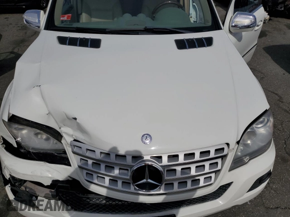 2010 Mercedes-Benz M 350 with VIN 4JGBB2FB0AA586441, listed as a Copart auction lot 49025215 with 144,977 mi miles and Salvage Title. Bid and sale history available at DreamBid. Image 12.