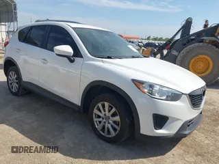 2013 Mazda CX-5 Sport z VIN JM3KE2BE5D0135213, wystawiony jako IAAI lot #42270730 z przebiegiem 140 917 mil mil oraz . Historia ofert i sprzedaży dostępna na DreamBid. Obrazek 1.