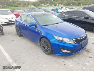 2012 Kia Optima SX with VIN 5XXGR4A63CG027016, listed as a IAAI auction lot 42089101 with 150,707 mi miles. Bid and sale history available at carsss.com. Image 1.