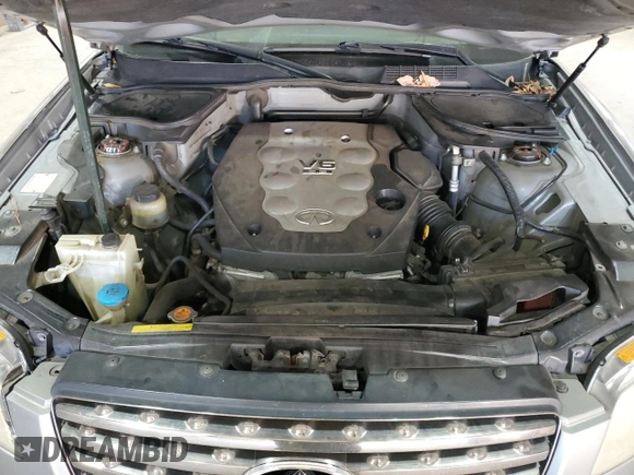 2005 Infiniti FX z VIN JNRAS08W25X200190, wystawiony jako Copart lot #86908434 z przebiegiem 269 591 mil mil oraz Szkoda całkowita • Salvage title. Historia ofert i sprzedaży dostępna na DreamBid. Obrazek 12.
