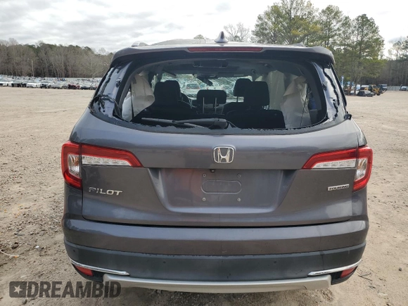 2020 Honda Pilot Touring 8-Passenger with VIN 5FNYF5H91LB004386, listed as a Copart auction lot 85913984 with 54,692 mi miles and Salvage Title. Bid and sale history available at DreamBid. Image 6.