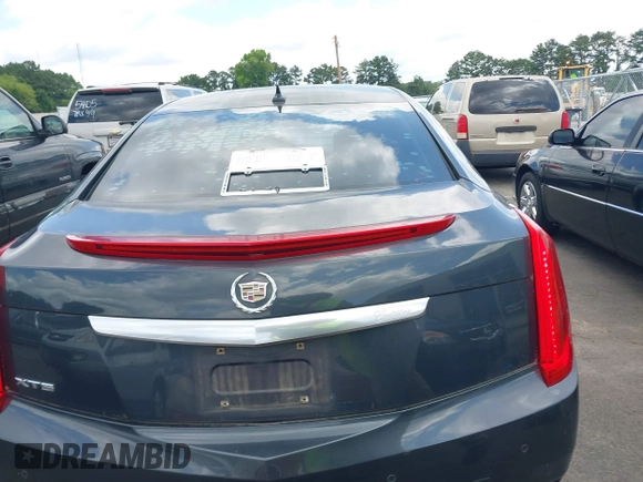 2013 Cadillac XTS Luxury с VIN 2G61P5S34D9183910, выставлен на аукционе IAAI как лот 42479531 с пробегом 160 798 миль миль и . История ставок и продаж доступна на DreamBid. Изображение 16.