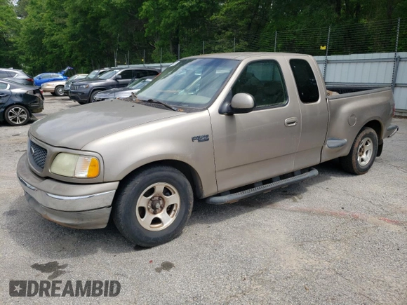 2003 Ford F-150 XL with VIN 1FTRX07213KD96765, listed as a Copart auction lot 53745465 with 292,863 mi miles and Salvage title. Bid and sale history available at DreamBid. Image 1.
