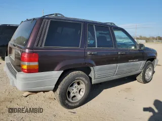 1998 Jeep Grand Cherokee Laredo with VIN 1J4FX58SXWC144715, listed as a Copart auction lot 86423594 with 93,936 mi miles and Clean Title. Bid and sale history available at carsss.com. Image 3.