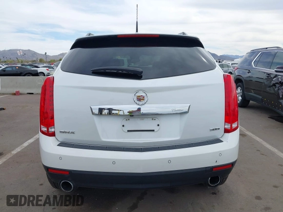 2012 Cadillac SRX Luxury Collection with VIN 3GYFNAE34CS606963, listed as a IAAI auction lot 41815097 with Not Provided miles and . Bid and sale history available at carsss.com. Image 16.