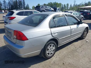 2003 Honda Civic LX with VIN JHMES16503S000239, listed as a IAAI auction lot 42184911 with 148,257 mi miles and . Bid and sale history available at DreamBid. Image 4.
