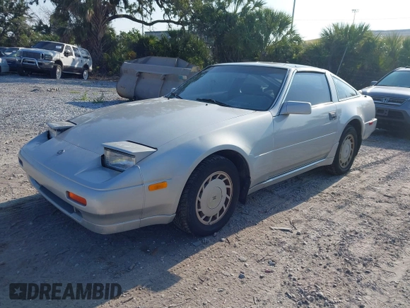 1987 Nissan 300ZX z VIN JN1HZ14S6HX214121, wystawiony jako IAAI lot #42204712 z przebiegiem 218 637 mil mil oraz . Historia ofert i sprzedaży dostępna na DreamBid. Obrazek 2.