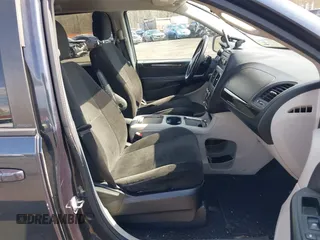 2013 Dodge Grand Caravan SXT with VIN 2C4RDGCG2DR652708, listed as a IAAI auction lot 42043026 with 245,442 mi miles and . Bid and sale history available at DreamBid. Image 5.