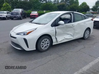 2019 Toyota Prius L Eco z VIN JTDKARFU3K3102222, wystawiony jako IAAI lot #42291403 z przebiegiem 27 669 mil mil oraz . Historia ofert i sprzedaży dostępna na DreamBid. Obrazek 2.