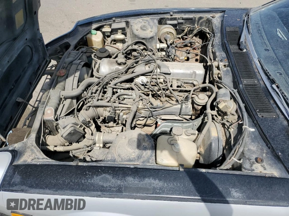 1982 Datsun 280ZX z VIN JN1HZ04SXCX448748, wystawiony jako Copart lot #87670125 z przebiegiem 136 264 mil mil oraz Szkody całkowita. Historia ofert i sprzedaży dostępna na DreamBid. Obrazek 11.