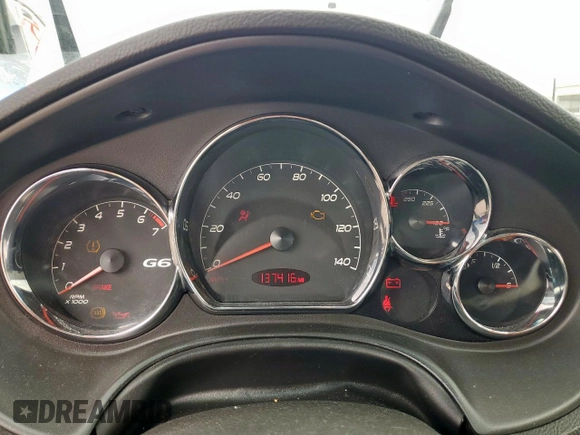 2009 Pontiac G6 1SA z VIN 1G2ZG57N394176715, wystawiony jako Copart lot #58756565 z przebiegiem 137 416 mil mil oraz Czysty tytuł • Clean title. Historia ofert i sprzedaży dostępna na DreamBid. Obrazek 9.