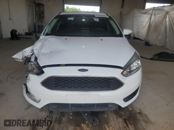 2016 Ford Focus SE with VIN 1FADP3F24GL403808, listed as a Copart auction lot 61914245 with 52,162 mi miles and Salvage title. Bid and sale history available at DreamBid. Image 5.
