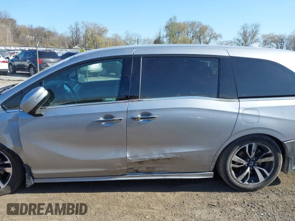 2018 Honda Odyssey Elite z VIN 5FNRL6H91JB070355, wystawiony jako IAAI lot #41975916 z przebiegiem 147 022 mil mil oraz . Historia ofert i sprzedaży dostępna na DreamBid. Obrazek 15.
