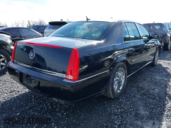 2006 Cadillac DTS 1SC z VIN 1G6KD57YX6U100634, wystawiony jako IAAI lot #41671007 z przebiegiem Nie podano mil oraz . Historia ofert i sprzedaży dostępna na DreamBid. Obrazek 4.