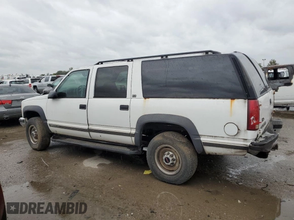 1997 GMC Suburban z VIN 1GKGK26JXVJ715765, wystawiony jako Copart lot #73188284 z przebiegiem 301 101 mil mil oraz Szkoda całkowita • Salvage title. Historia ofert i sprzedaży dostępna na DreamBid. Obrazek 2.