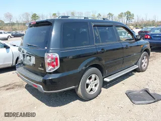 2007 Honda Pilot EX-L with VIN 2HKYF18537H502361, listed as a IAAI auction lot 42039836 with 167,431 mi miles. Bid and sale history available at carsss.com. Image 4.
