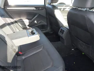 2014 Volkswagen Passat SE w/Sunroof with VIN 1VWBT7A34EC058651, listed as a IAAI auction lot 41674952 with 117,932 mi miles. Bid and sale history available at carsss.com. Image 8.