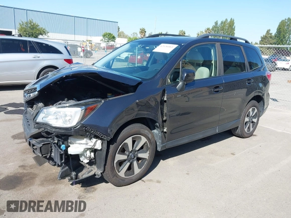 2017 Subaru Forester Premium with VIN JF2SJAGC8HH590684, listed as a IAAI auction lot 42136061 with 59,797 mi miles and . Bid and sale history available at DreamBid. Image 18.
