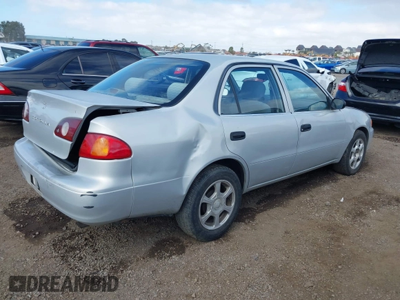 2002 Toyota Corolla CE with VIN 1NXBR12E12Z639542, listed as a IAAI auction lot 41535788 with 204,999 mi miles and . Bid and sale history available at DreamBid. Image 4.