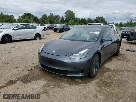 2023 Tesla Model 3 with VIN 5YJ3E1EA3PF672023, listed as a Copart auction lot 57571645 with 18,115 mi miles and Salvage title. Bid and sale history available at DreamBid. Image 13.